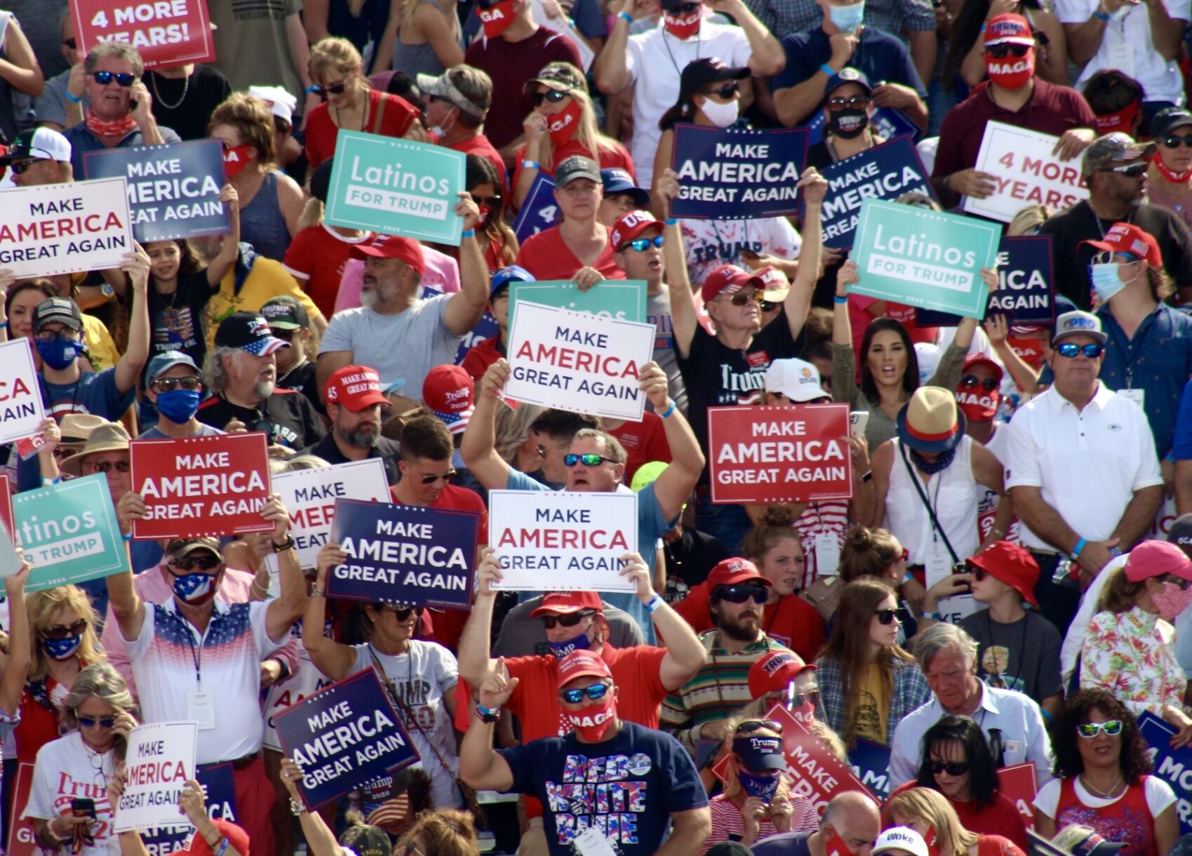 {INSERT ALL IMAGES 8 out of 8: GROUPS OF PEOPLE WITH SIGNS}